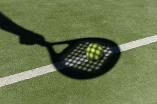 Shadow racket paddle with a ball